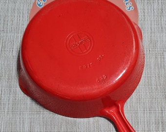 Griswold #6 P/N 699 'D' Makers Mark, flamingo red porcelain with cream lining cast iron skillet