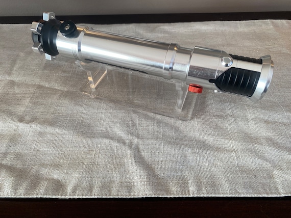 WANLIAN Supporto per spada laser in acrilico trasparente, espositore verticale a 1 foro (adatto per spade laser con diametro inferiore a 53 mm