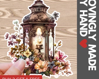 Cute sticker featuring vintage lantern with flowers made with water resistant vinyl ideal for water bottle, laptop, kindle, cell phone, book