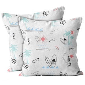 May include: Two white pillowcases with a beach-themed pattern. The pattern includes palm trees, surfboards, sunglasses, and the words "Beach" and "All Beach".