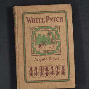 May include: A tan hardcover book titled White Patch by Angelo Patri. The cover features a green rectangular border, a central illustration of two ants, and a row of six brown ant silhouettes at the bottom, all printed in brown and green ink.