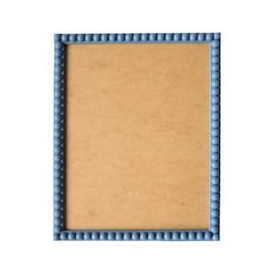 May include: A light blue picture frame with a beaded border. The frame is empty and ready to hold a photograph.