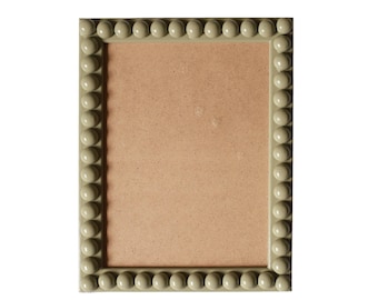 Moldura de bobina de pistache
