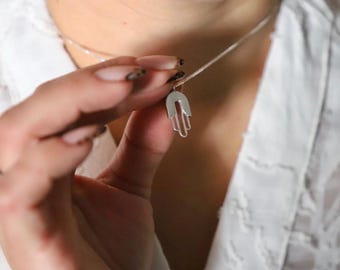 hamsa pendant designed in a clean and modern design