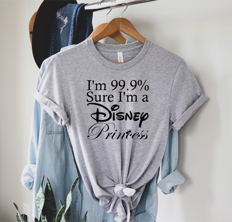 May include: Gray t-shirt with black text that reads "I'm 99.9% Sure I'm a Disney Princess".