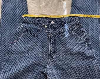 May include: A pair of blue denim jeans with a checkered pattern. The jeans have a high waist and a straight leg. The jeans are measured with a tape measure, showing a waist size of 30 inches.