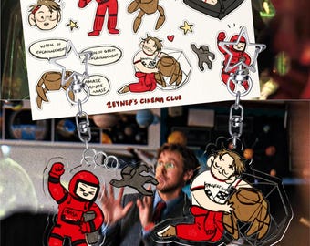 Hoja de pegatinas y llaveros del Proyecto Ave María