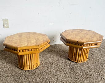 May include: Two octagonal bamboo end tables with woven tops. The tables are made of natural bamboo and have a light brown color.