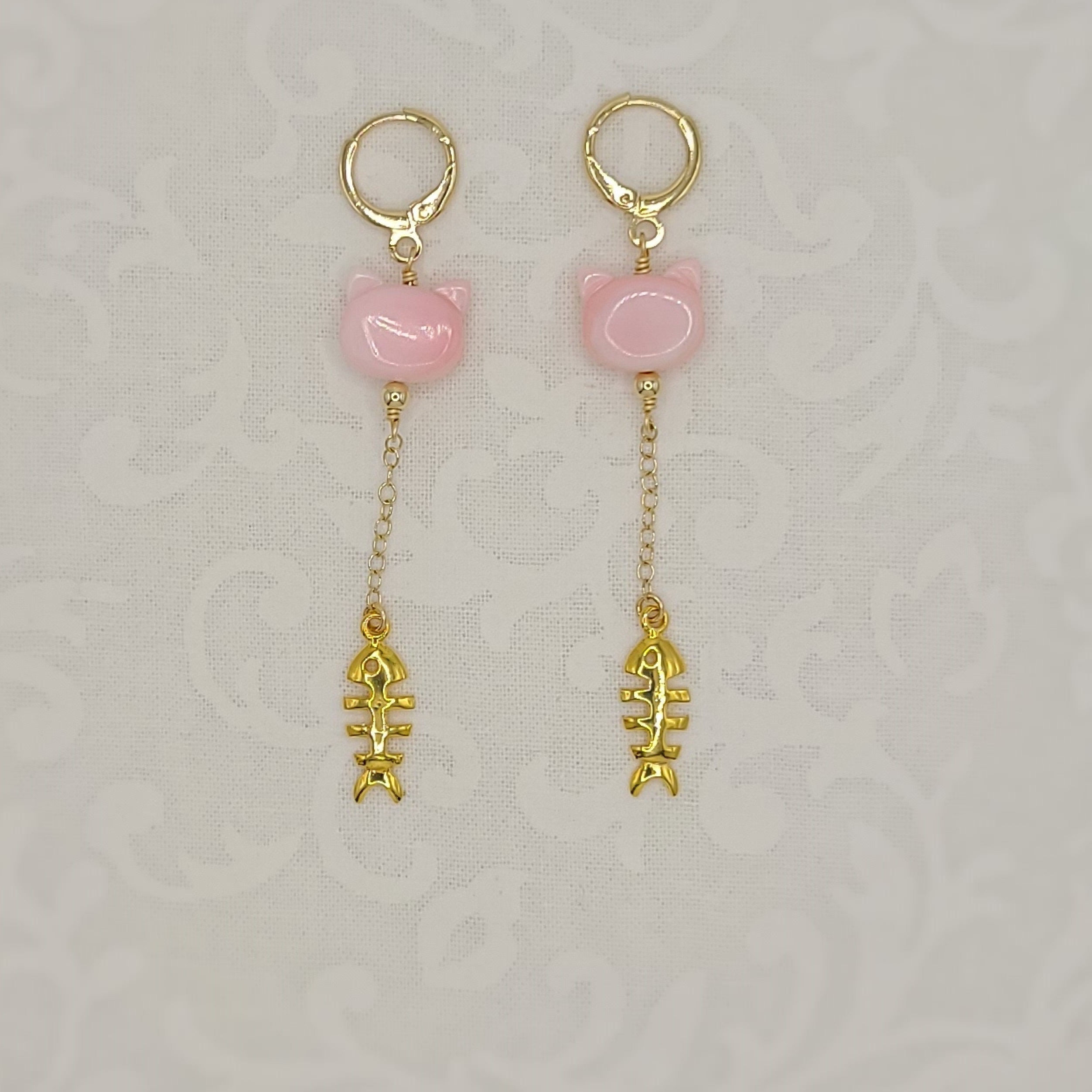 Pink Conch Shell Cat With Dangling Golden Fishbone Huggie Earrings for ...