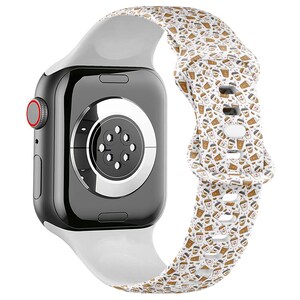 May include: White silicone Apple Watch band with a coffee cup pattern. The band is compatible with Apple Watch Series 4 and later.