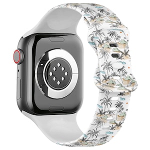 May include: White silicone Apple Watch band with a tropical palm tree print. The band has a black and white design with blue clouds and orange suns.