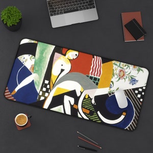 May include: Abstract art mousepad featuring a colorful design with geometric shapes, a woman's figure, and a white mouse. The design includes shades of red, yellow, blue, green, black, and white.