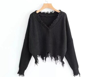 grey frayed sweater