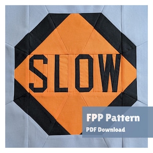 May include: A square quilt block featuring an orange octagon with a black border and the word SLOW in black block letters. The background is light blue. A semi-transparent overlay in the bottom right corner displays the text FPP Pattern PDF Download.