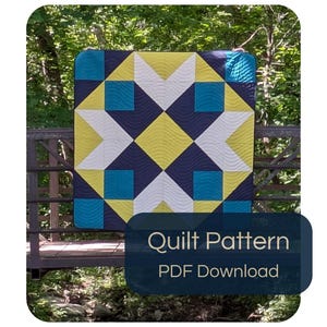 May include: A square quilt featuring a geometric star pattern in navy blue, bright yellow, white, and teal. The fabric surface displays a wavy, continuous line quilting texture. The text "Quilt Pattern PDF Download" is overlaid on the image.
