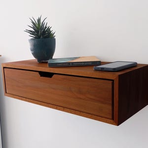 Custom-sized modern floating nightstand in solid wood. No customs duty for USA and EU. Wall-mounted bedside table, custom size