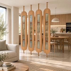 May include: Four floor-to-ceiling wooden room dividers with rounded ends, each featuring a central vertical glass panel. The glass panels contain geometric patterns with orange, green, and gold accents, held in place by adjustable tension rods.