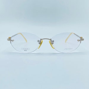 Shıseıdo Mod.2017 Années 90 / Lunettes de vue uniques ovales en titane sans monture vintage / Montures pour femmes / NOS / Fabriqué au Japon