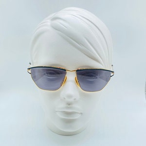 Gafas de sol vintage de ojo de gato: montura de metal con encanto de los años 90, fabricadas en Italia