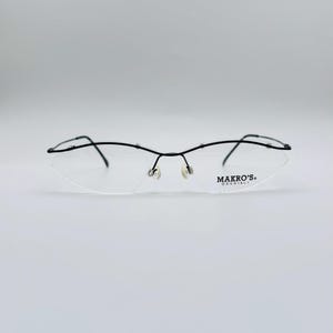 Makro's Occhiali mod. 7024、90年代、ヴィンテージ マットブラック スモール リムレス キャットアイ ユニーク グラス、女性用および男性用フレーム、NOS