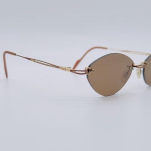 Flair Mod mod. Jet Set 620 , 90s , vintage gold and brown , cat eye rimless titanium sunglasses , men & women frames , NOS