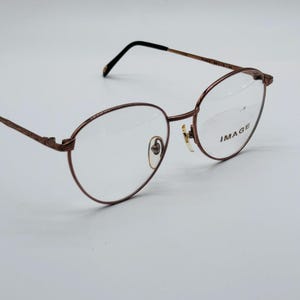 İmage Fire Fox F-013  90s vintage brown unique round glasses women & men frames NOS