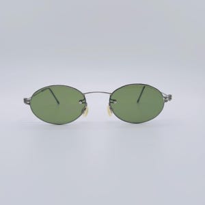 Vintage Bluebay Titanium Rimless Sunglasses: 90s Oval Frames