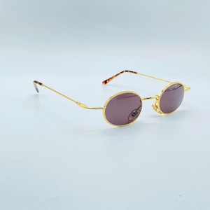 Europa Valottica 476 90s vintage gold small slim oval unique sunglasses women & men frames NOS made in italy