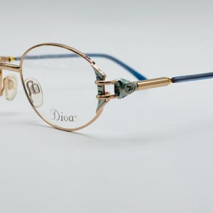 Vintage Oval Eyeglasses: Gold & Blue Frames, Made in Italy (NOS)