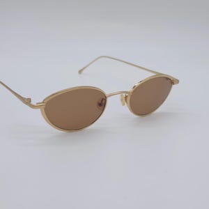 Óculos de sol vintage estilo gatinho dourado: Armações Organix dos anos 90, NOS