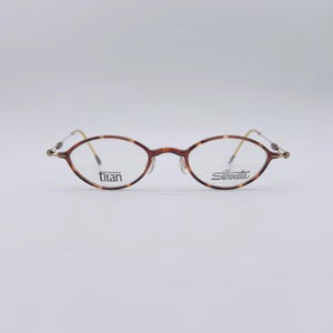 Silhouette M 1905 6055 90s vintage gold and tortoise titanium slim oval eyeglasses women & men frames NOS made in austria