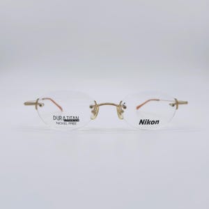 Vintage Nikon Titanium Rimless Oval Eyeglasses - 90s Gold Frames NOS