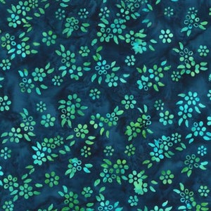 May include: Dark blue fabric with a repeating pattern of stylized flowers in shades of green and turquoise. The floral design is scattered across the fabric, creating a visually appealing and textured surface. The fabric appears to be suitable for quilting or crafting projects.