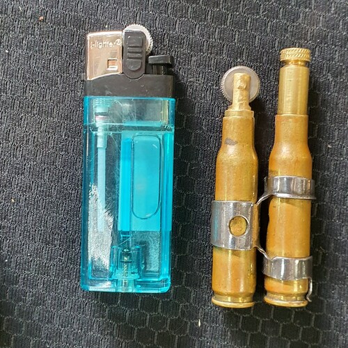 Handmade lighter collection parts in the form of bullets, locomotives, spoons, keys. Shelf decor, tabletop figurines, table ornaments shops