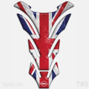 May include: A motorcycle tank pad featuring the Union Jack flag design. The pad is primarily red, white, and blue, with a distressed, vintage appearance. The design is a stylized, symmetrical shape.