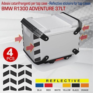 May include: A silver motorcycle top box with black detailing and reflective stickers. The image includes the text "BMW R1300 ADVENTURE 37LT" and "REFLECTIVE". The stickers are black chevrons. A red circle indicates "4 PCS".