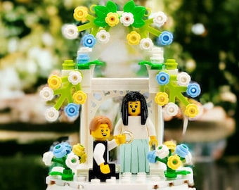 A flowery brick wedding arch, ideal for cake topper or decoration, "La Boho" by Les Portraits de Felie