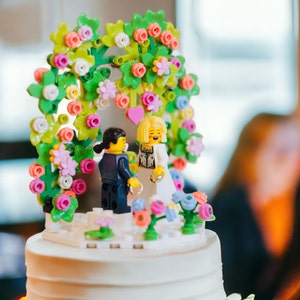 A flowery brick wedding arch, ideal for cake topper or decoration, "La Champêtre" by Les Portraits de Felie