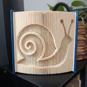 Vouwpatroon voor een slakvormig boekje - Eenvoudig knip- en vouwpatroon voor beginners