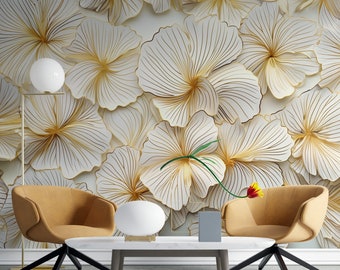 May include: A modern living room with a floral wallpaper featuring white and gold flowers. Two mustard-colored armchairs face a white marble coffee table. A floor lamp and a decorative flower complete the scene.