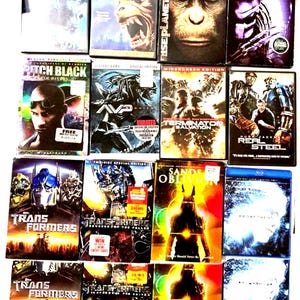 Op de afbeelding: Een verzameling dvd's met sciencefiction- en actiefilms. Titels zijn onder meer "Transformers", "Pitch Black", "Terminator Salvation" en "Prometheus". De covers tonen verschillende personages en scènes, met een mix van kleuren en graphics.