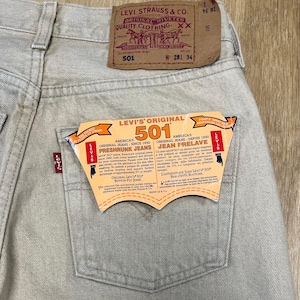 Vintage Levi's 501 cream jeans - Size W28 L34