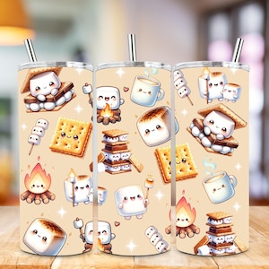 May include: Three stainless steel tumblers with a light brown background and a pattern of cartoon marshmallows, graham crackers, chocolate squares, and campfires. The tumblers are all the same size and have a lid.