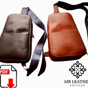 Puede incluir: Dos bolsos de bandolera de cuero, uno marrón y otro negro, con correas ajustables. Los bolsos tienen un diseño sencillo con un solo bolsillo en la parte delantera. La imagen incluye el texto "MB LEATHER ARTISAN".