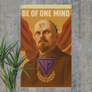 May include: A wall hanging with the text "BE OF ONE MIND" above a portrait of a man with a stern expression. The man has a symbol on his forehead and a purple emblem on his chest, with a red star and laurel wreath below.