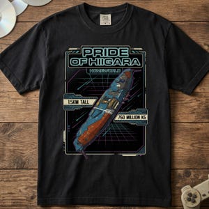 May include: A black t-shirt featuring a graphic of a blue and orange spaceship. The text reads PRIDE OF HIIGARA, HOMEWORLD, 1.5KM TALL, and 760 MILLION KG. The design includes a grid background with neon lines, set against a dark, space-themed frame.