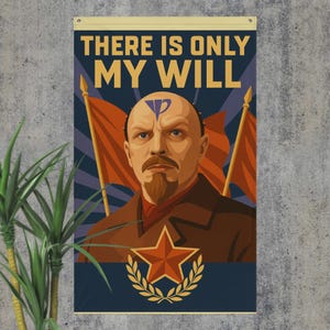 May include: A wall flag with the text "THERE IS ONLY MY WILL" above a portrait of a man with a goatee. The man is set against a backdrop of red flags, a star, and a laurel wreath. The flag is tan with a dark blue background.