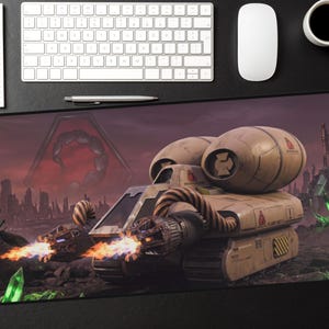 May include: A rectangular mouse mat with a sci-fi vehicle design, firing flames, set against a red sky with a city silhouette. The design includes a scorpion emblem and glowing green crystals.