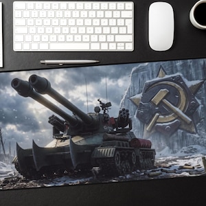 May include: A large rectangular mousepad featuring a detailed illustration of a military tank with two large cannons, set against a snowy, mountainous backdrop. A Soviet emblem is also visible. The mousepad is surrounded by a black border.