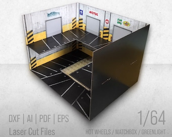 May include: A 1/64 scale garage diorama made of cardboard. The diorama features a black and white checkered floor, yellow and black warning stripes, and a gray concrete wall with a garage door. The diorama is labeled "Garage Diorama" and "1/64".
